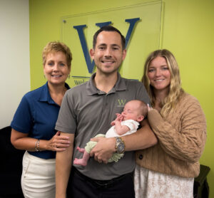 Sheri Welsh with Spencer and Alisha Welsh holding their baby daughter.